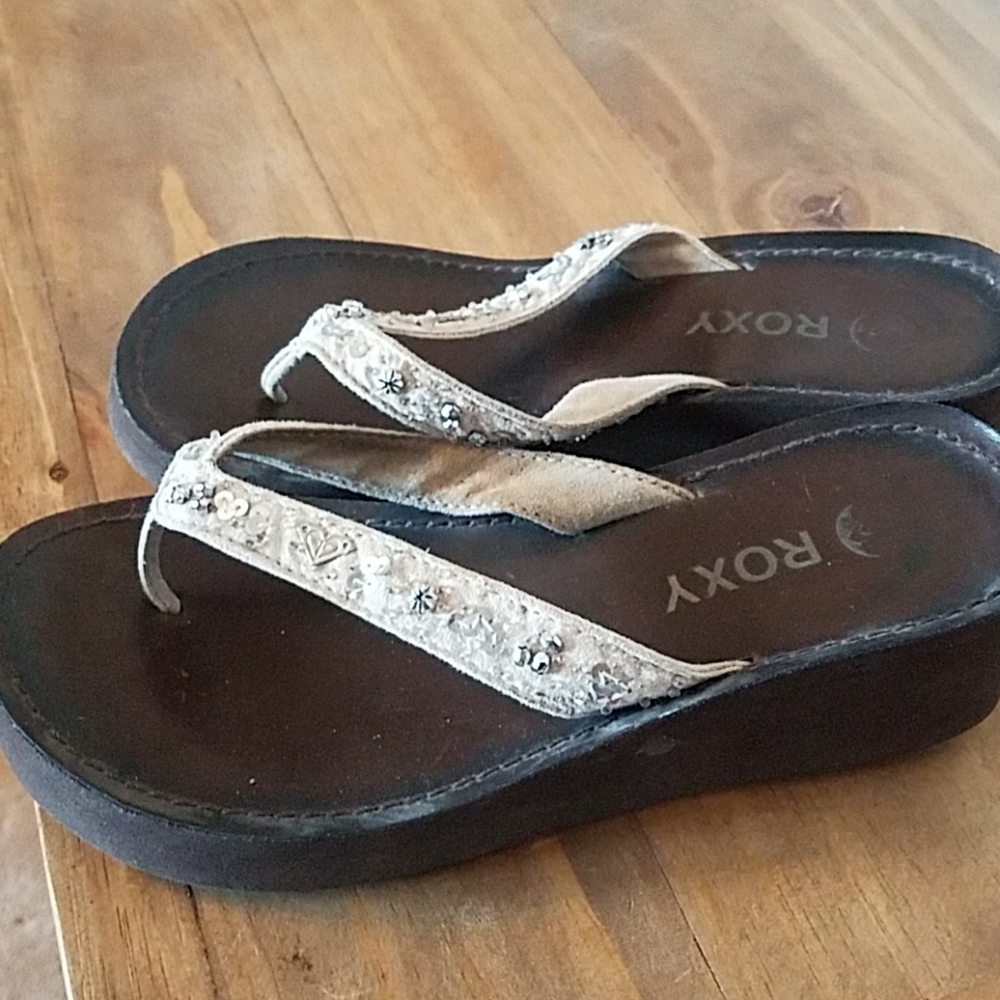 Roxy sandals, flip flops.